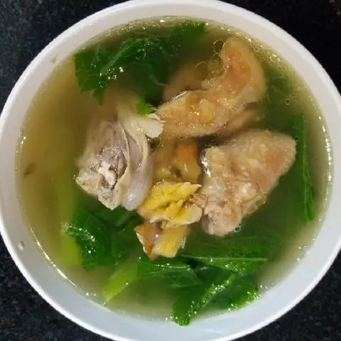 Hình ảnh Canh gà nấu cải bẹ xanh