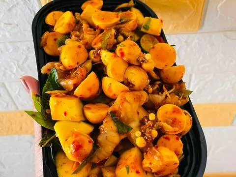 Hình ảnh Chân gà mix trứng non sốt Thái