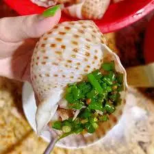 Hình ảnh Ốc giấy nướng mỡ hành