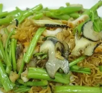 Hình ảnh Ốc mỡ xào rau muống