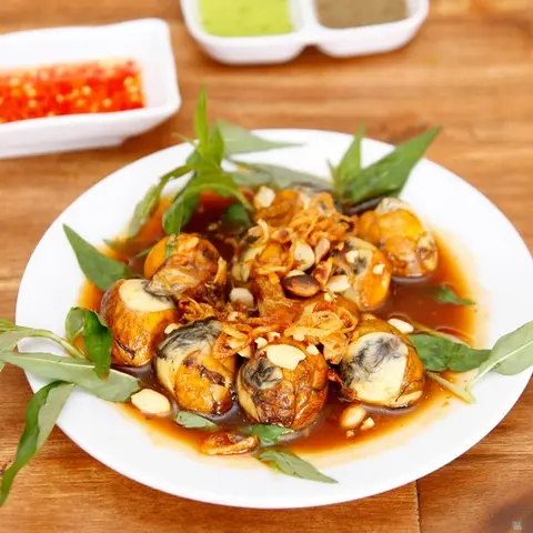 Hình ảnh Trứng cút lộn xào me