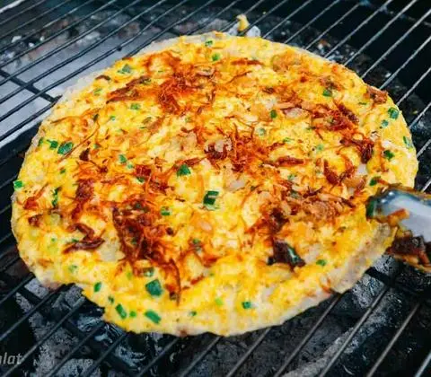 Hình ảnh Bánh tráng nướng hành khô bò đỏ phô mai