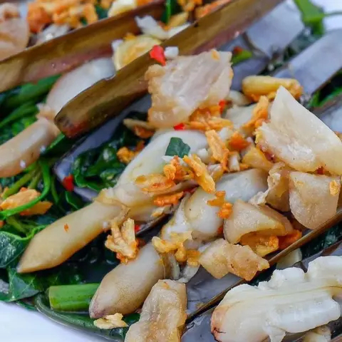 Hình ảnh Ốc móng tay cháy tỏi
