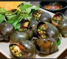 Hình ảnh Ốc bươu nướng tiêu xanh