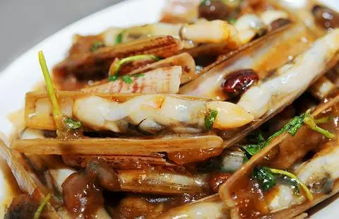 Hình ảnh Ốc móng tay xào me