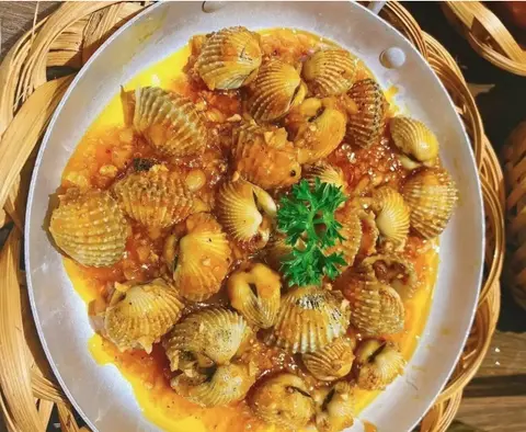 Hình ảnh Sò huyết xào bơ cay