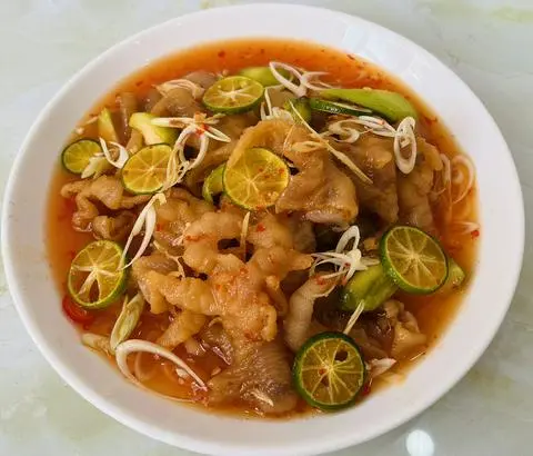 Hình ảnh Chân gà rút xương sốt sả tắc - Nhỏ