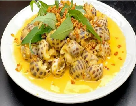 Hình ảnh Ốc hương xào bơ tỏi