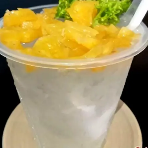 Hình ảnh Nước dừa tươi mix thơm rim đường phèn