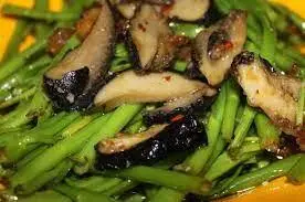 Hình ảnh Ốc giác xào rau muống