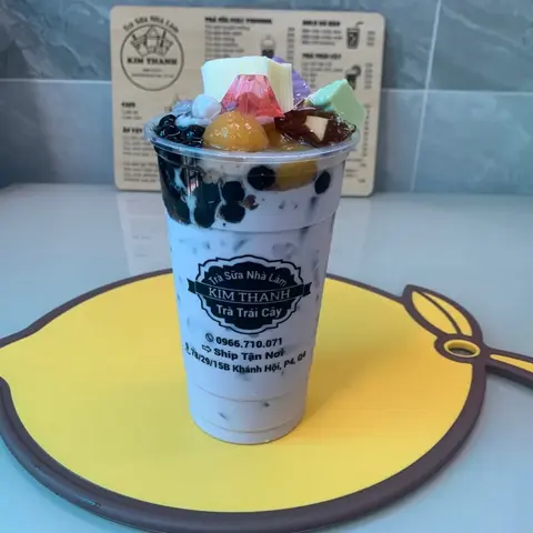 Hình ảnh Trà sữa khoai môn full topping 