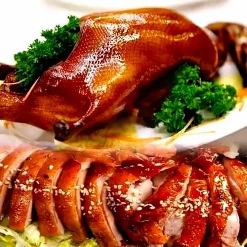 Hình ảnh Vịt nướng lá mắc mật - nửa con