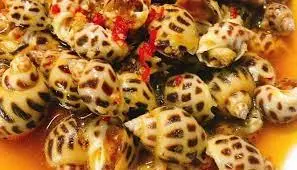 Hình ảnh Ốc hương xào me