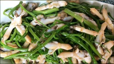 Hình ảnh Ốc xào rau muống
