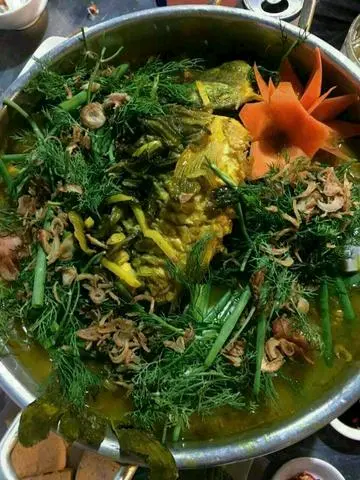Hình ảnh Cá chép om dưa