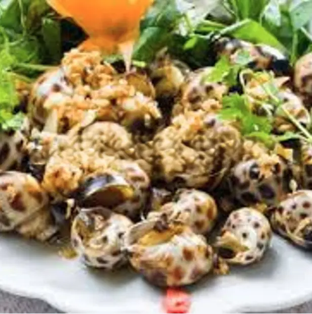 Hình ảnh Ốc hương xào tỏi