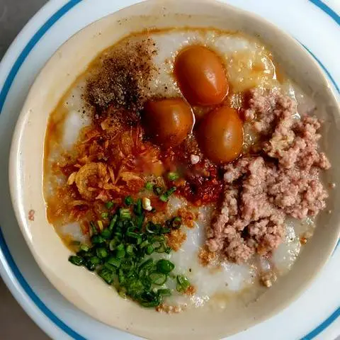 Hình ảnh Cháo thịt bằm trứng cút rim nước mắm