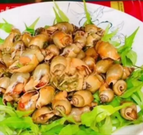 Hình ảnh Ốc cà na rang me