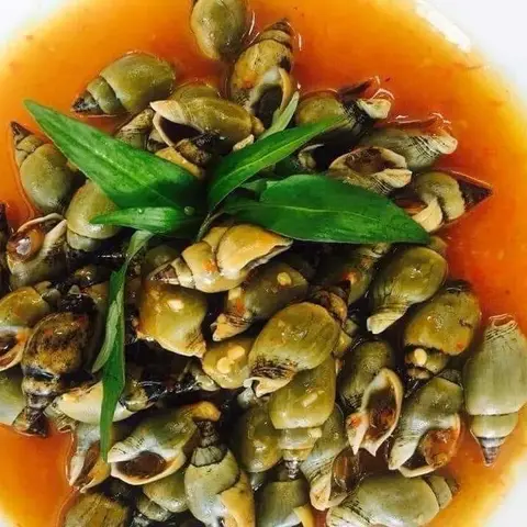 Hình ảnh Ốc cà na xào bơ cay