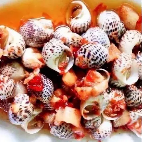 Hình ảnh Ốc bông xào bơ cay