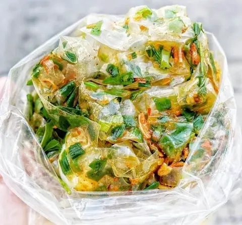 Hình ảnh Bánh tráng trộn phơi sương mỡ hành bơ tỏi