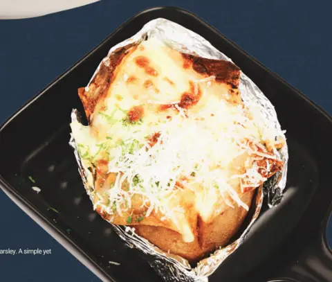 Hình ảnh Stuffed baked potato with sausage - cheese