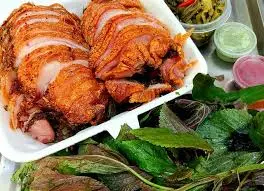 Hình ảnh Giò heo nướng lá mắc mật