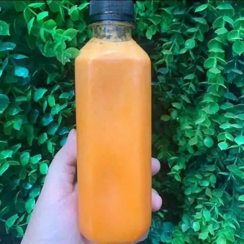 Hình ảnh Chai nước ép thơm - cà rốt