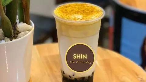 Hình ảnh Sữa tươi trân châu đường đen kem trứng nướng
