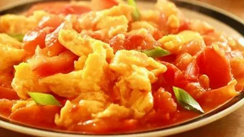 Hình ảnh Cơm trứng chiên cà chua - hành tây