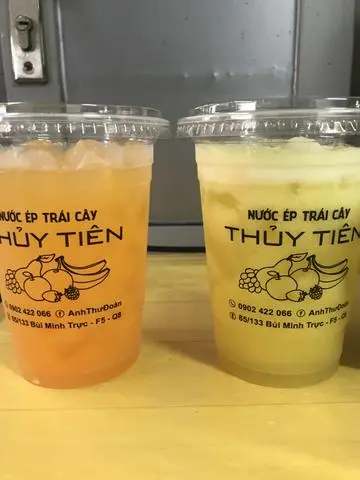 Hình ảnh Combo cam ép - thơm ép hai ly lớn