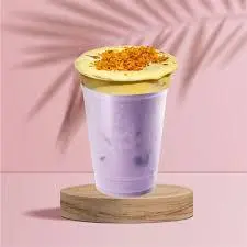 Hình ảnh Trà sữa hoa đậu biếc kem trứng cháy