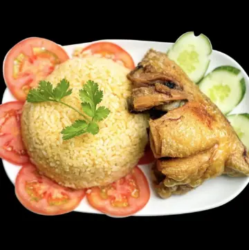 Hình ảnh Cơm gà xối mỡ - má đùi lớn