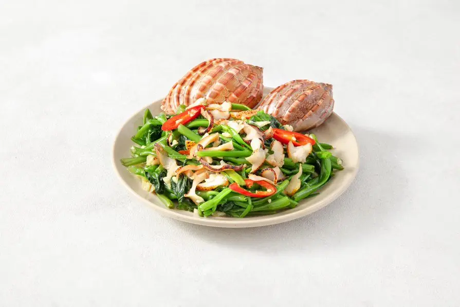 Hình ảnh Ốc khế xào rau muống