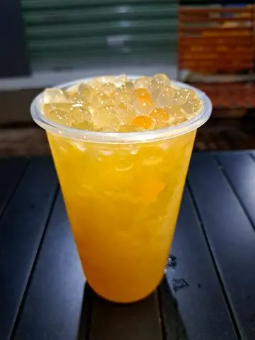 Hình ảnh Trà xoài cam tắc
