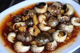 Hình ảnh Ốc bông xào me