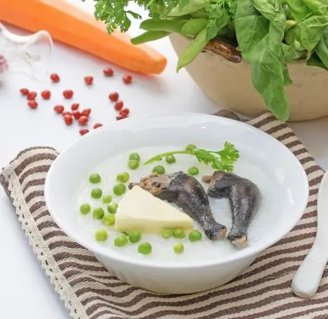 Hình ảnh Cháo gà ác hầm thuốc bắc lớn