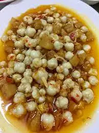 Hình ảnh Răng mực xào bơ cay