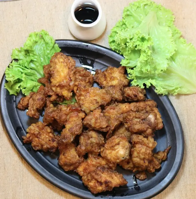 Hình ảnh Gà có xương sốt tương tỏi (Half) - 마늘 간장 치킨
