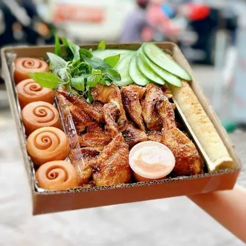 Hình ảnh 1 Gà nướng - 1 cơm lam - 5 bánh bao