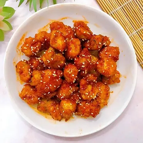 Hình ảnh Gà viên sốt cay