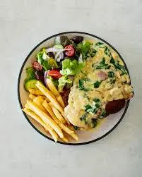 Hình ảnh Cotoletta boscaiola with salad